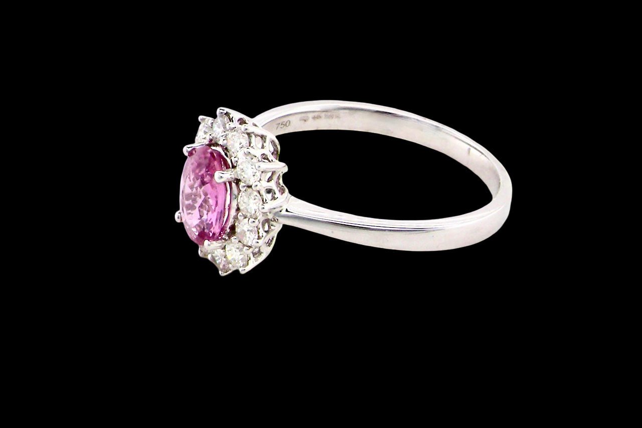 A modern Pink Sapphire and Diamond Ring