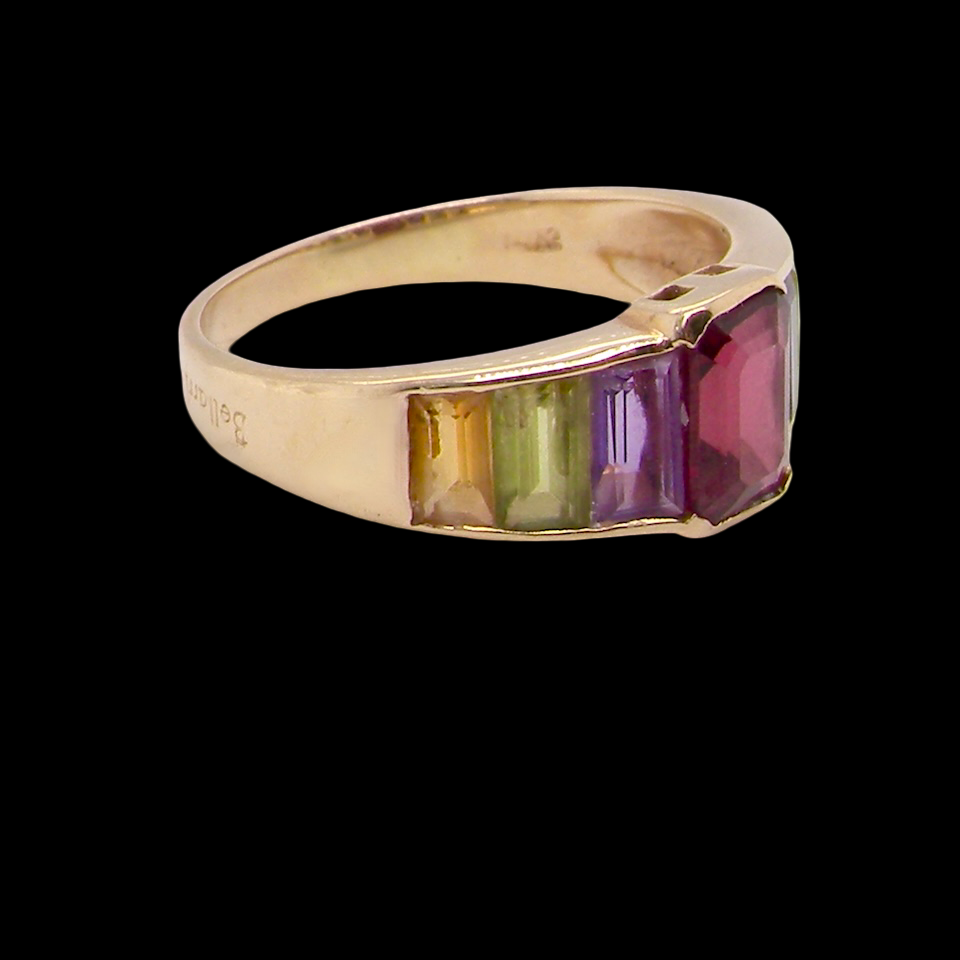 A multi gemstone dress ring