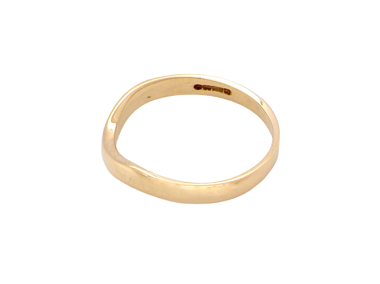 side A narrow 18 carat yellow gold wedding ring. This has a U shape which makes the placing of a cluster or even a solitaire engagement ring that much easier to place against as it will sit with the 'U'