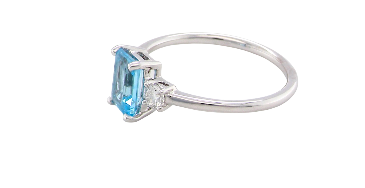 size A 9 carat white gold three stone ring. This ring is from our Heirloom Collection. This is when we take a stone from a pre-owned ring that is worn out, and reset it into a brand new setting.