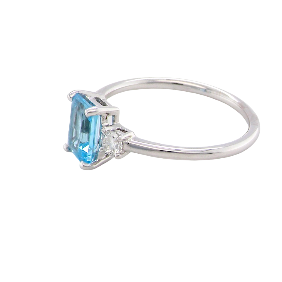 size A 9 carat white gold three stone ring. This ring is from our Heirloom Collection. This is when we take a stone from a pre-owned ring that is worn out, and reset it into a brand new setting.