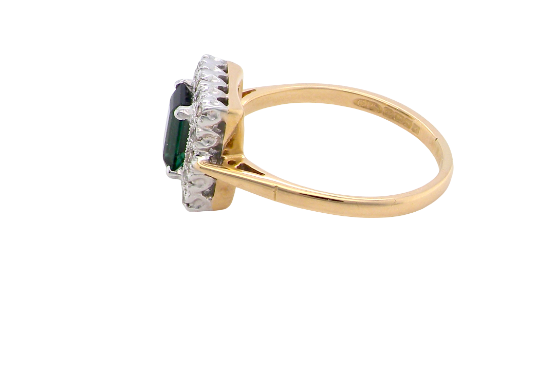side A near new cluster ring that shows no sign of wear, seems unworn.
Features a deep mint green tourmaline gemstone,