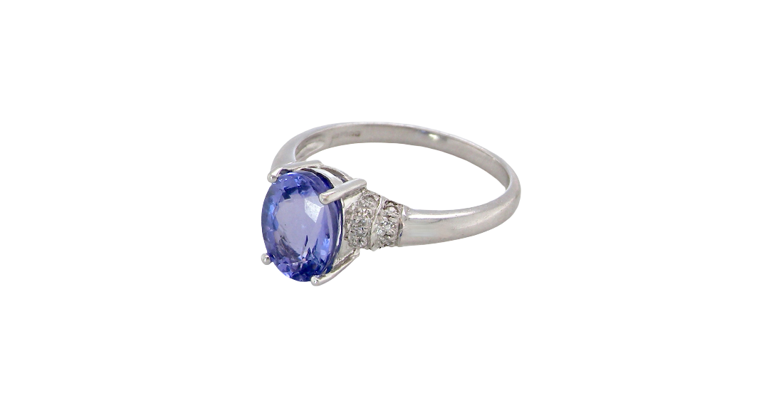 side A pretty 18 carat white gold ring that features an AAA Tanzanite gem stone. Displaying tones of purple and lilac the stone is oval cut at around 8x6mm (1.47 carat approx)
