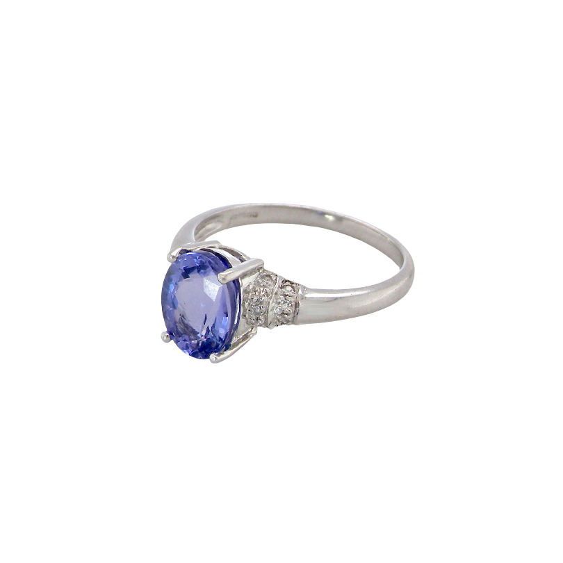 side A pretty 18 carat white gold ring that features an AAA Tanzanite gem stone. Displaying tones of purple and lilac the stone is oval cut at around 8x6mm (1.47 carat approx)
