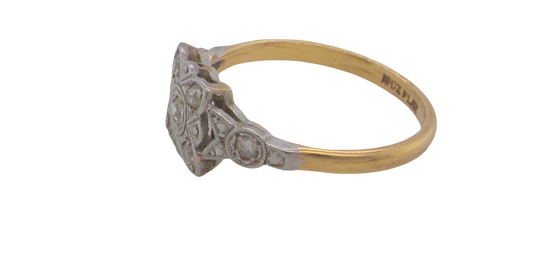 side A pretty diamond cluster ring from the early part of the 20th century. A square head that has within it small white diamonds, measures 8x8mm, fancy shoulders also set with tiny diamonds.