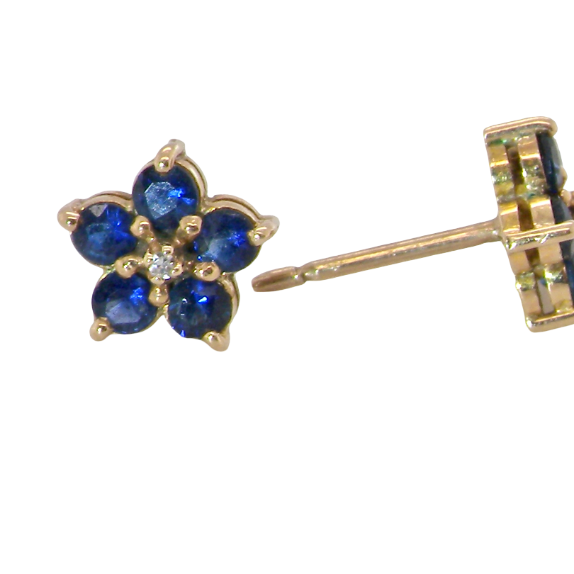 side A pretty pair of gold earrings each floral shaped with a small diamond centre stone surrounded by five petals, these round sapphires