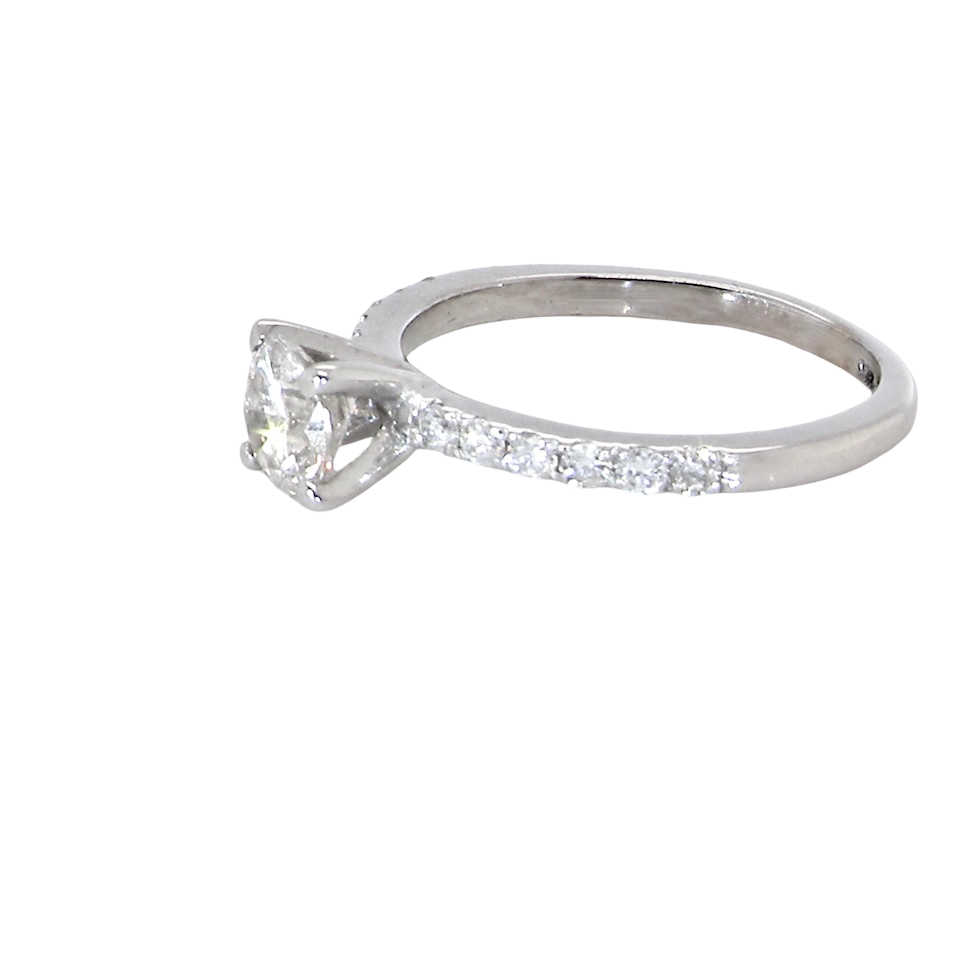 side A stunning 14-carat white gold* solitaire ring featuring a brilliant-cut white diamond.