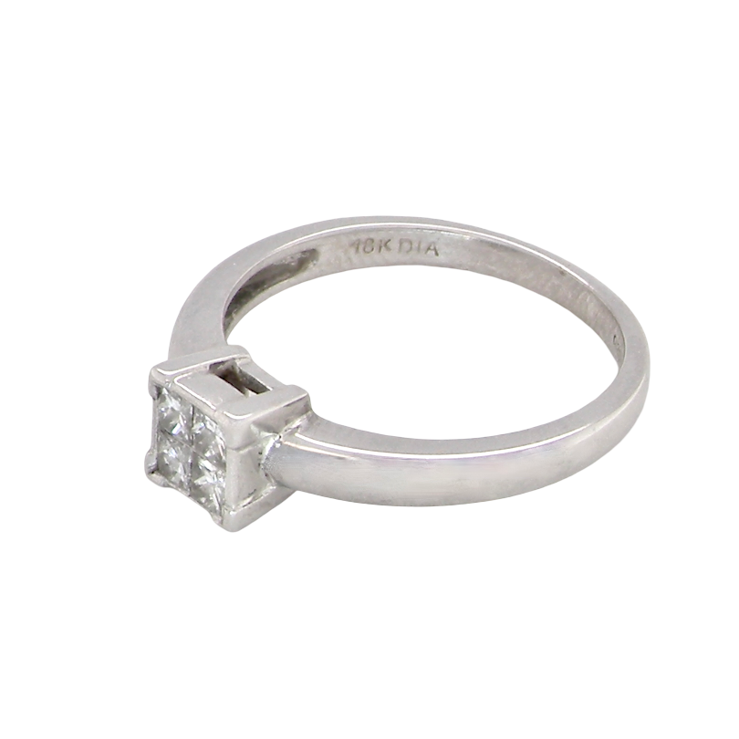 side A stylish modern 18 carat white gold diamond cluster ring, with a beautifully clean and understated design.
The square-shaped head is set with four Princess cut white diamonds,