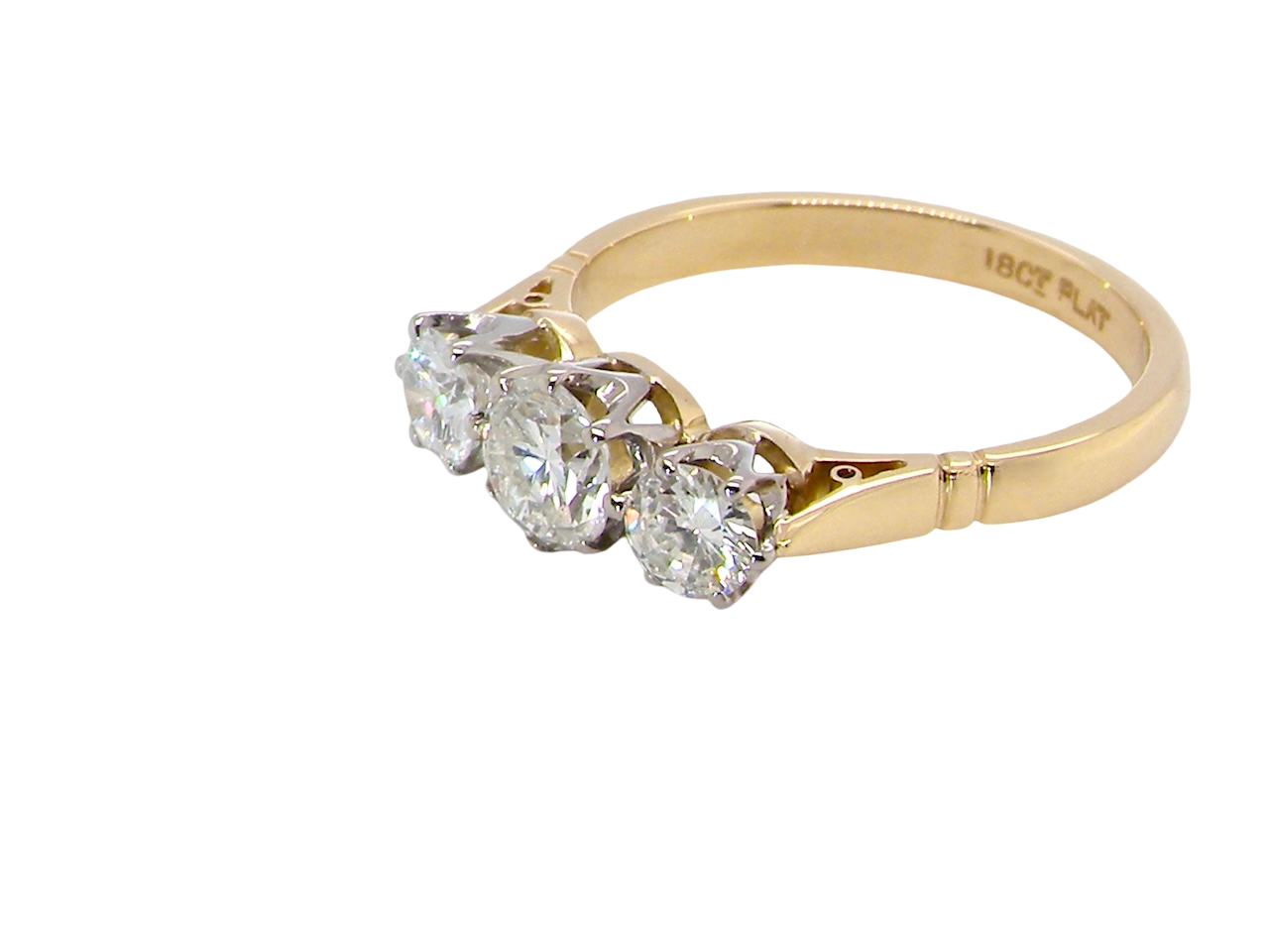 side A three stone trilogy ring. The diamond centre stone measures 5.5mm (est 0.60 carats) each side a 4mm diamond , total estimated at 1.10 carats.