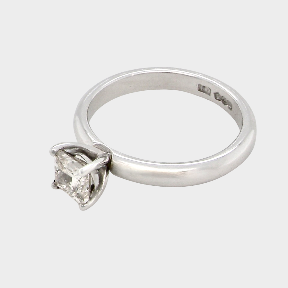 side A timeless and beautifully crafted solitaire ring featuring a stunning 0.78 carat Princess-cut white diamond