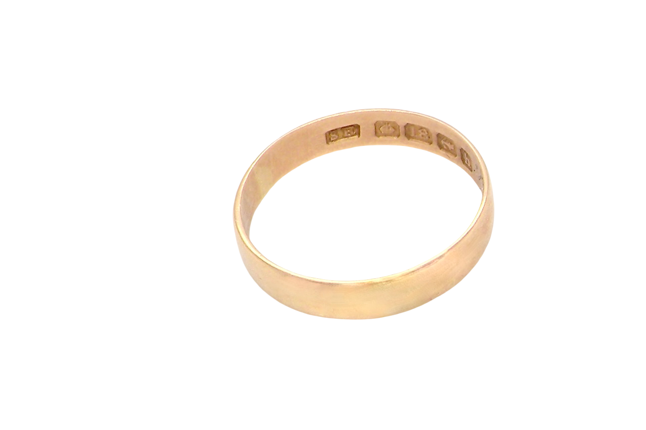 side A traditional 18 carat gold wedding ring.
A flat to a slight D shape profile, width 3.6mm. Weight 2.2grams.