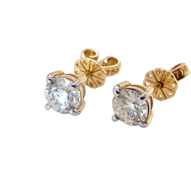 side A truly gorgeous pair of classic diamond stud earrings. Simple, elegant and effortlessly wearable, this timeless design is perfect for both day and evening wear