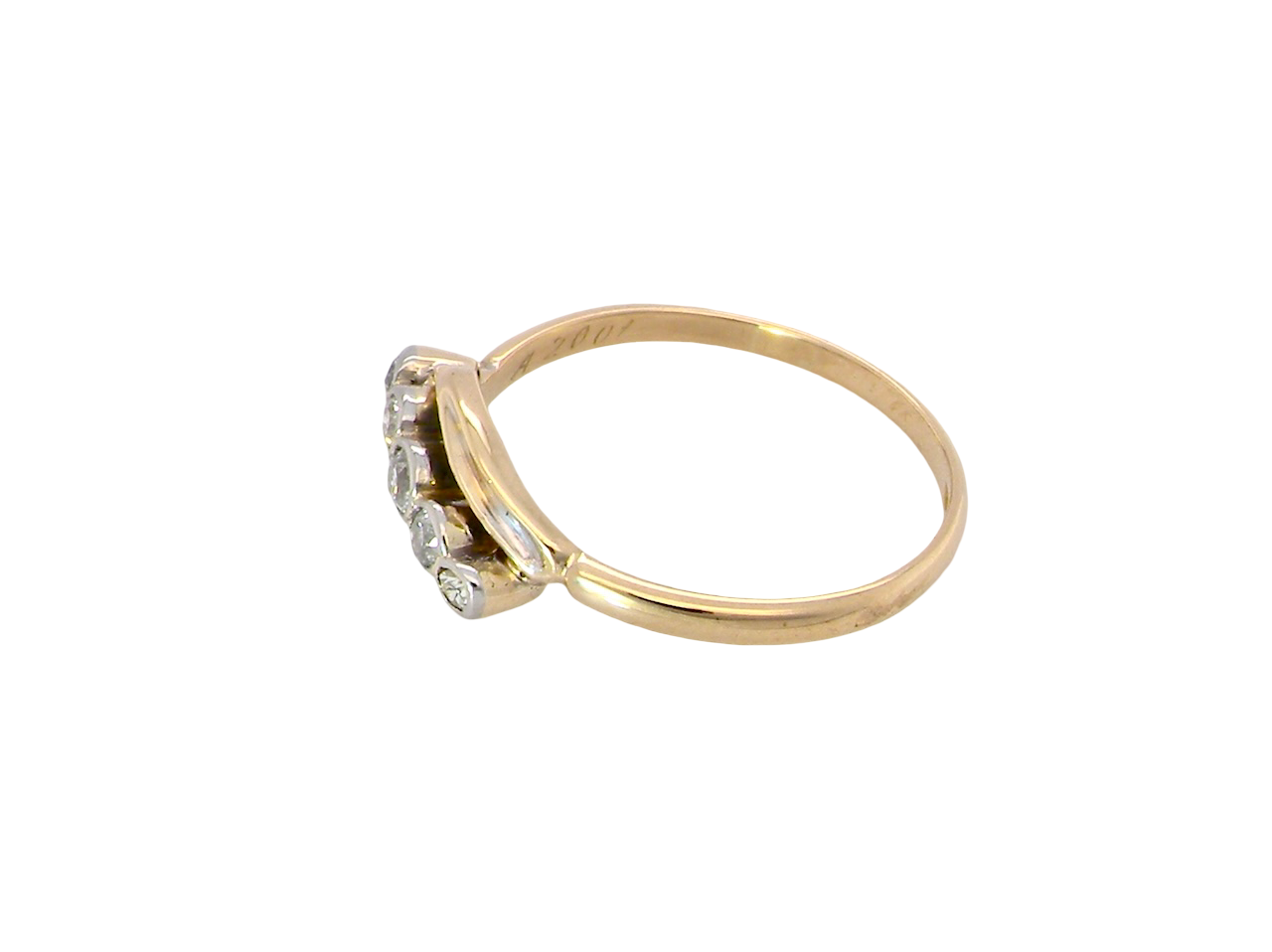 side A vintage cross over style ring. Set with five old brilliant cut white diamonds. Centre stone 3mm, each side 2.4mm, each end 1.5mm. Total diamond content estimated at 0.22 carats.