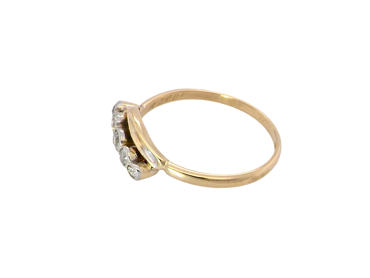 side A vintage cross over style ring. Set with five old brilliant cut white diamonds. Centre stone 3mm, each side 2.4mm, each end 1.5mm. Total diamond content estimated at 0.22 carats.