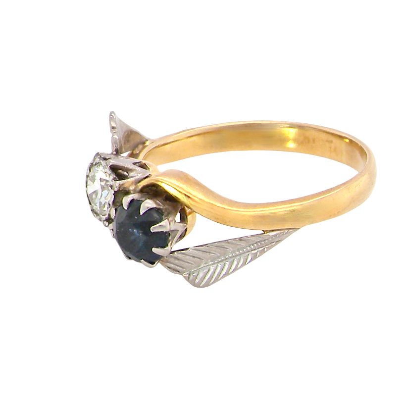 side A vintage crossover ring. Set with a round sapphire 5mm diameter, black blue colour.