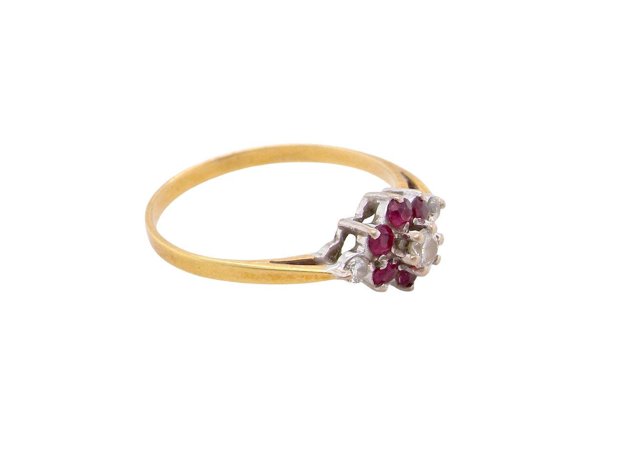 An 18 carat Yellow Gold Diamond and Ruby Cluster