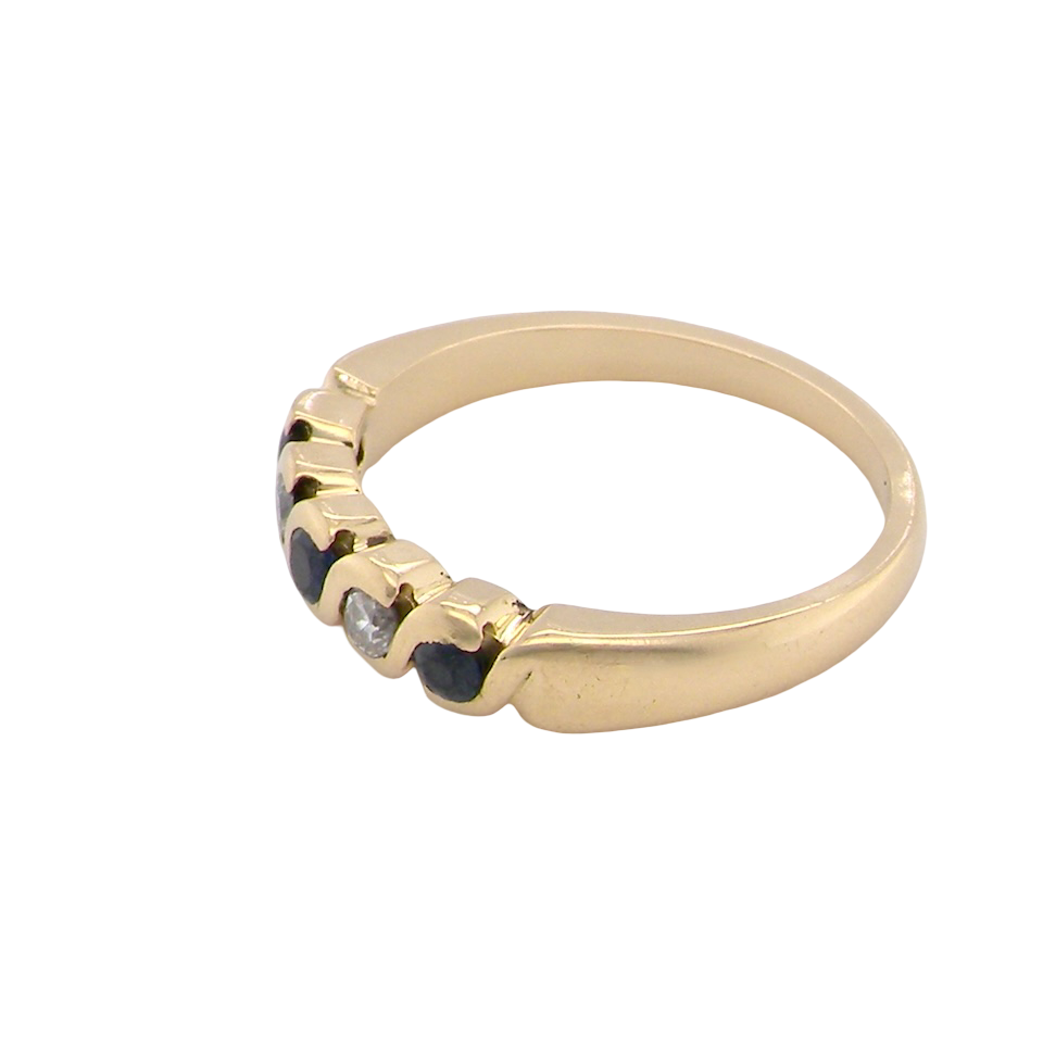 An 18 carat gold Sapphire and Diamond eternity ring