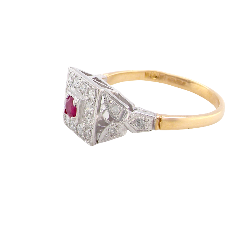 side An 18 carat gold square cluster that features to the centre a round ruby and an outer halo of brilliant cut white diamonds.