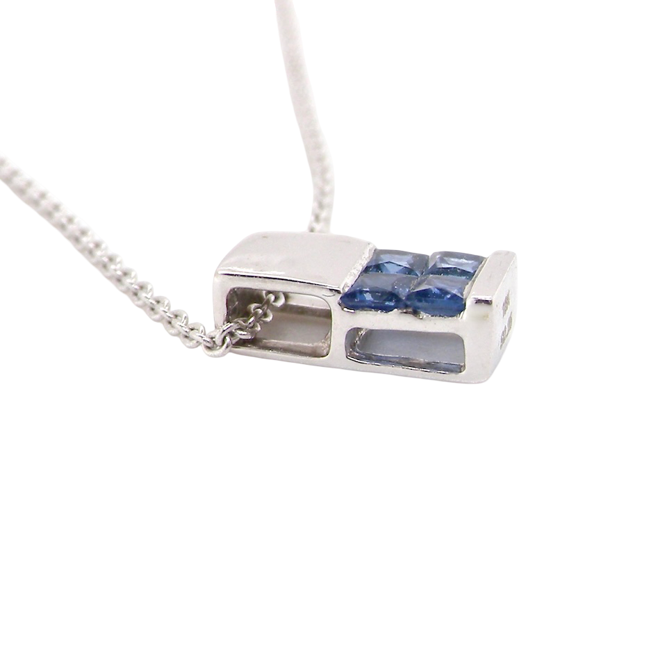 An 18 carat White Gold* Pendant with Sapphires