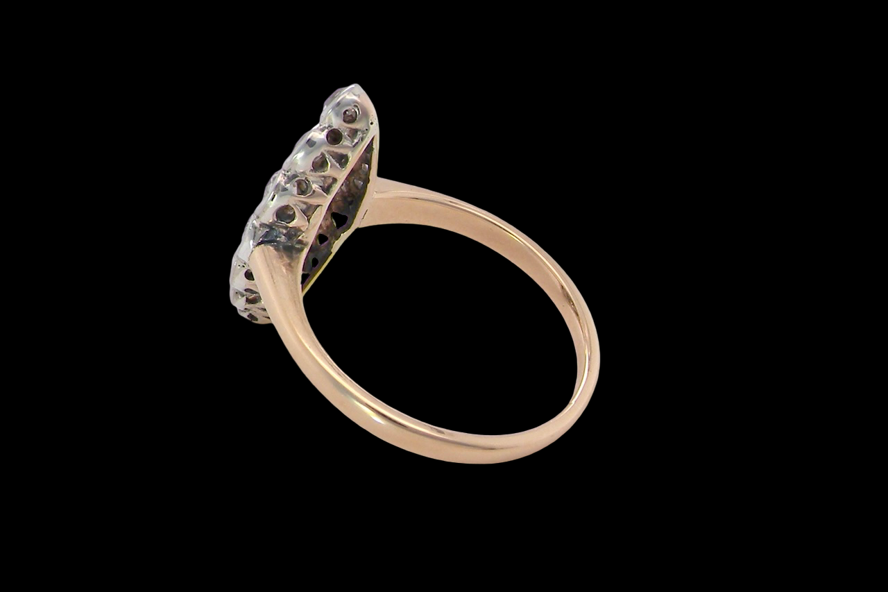 An Antique Marquise shaped Diamond Cluster Ring