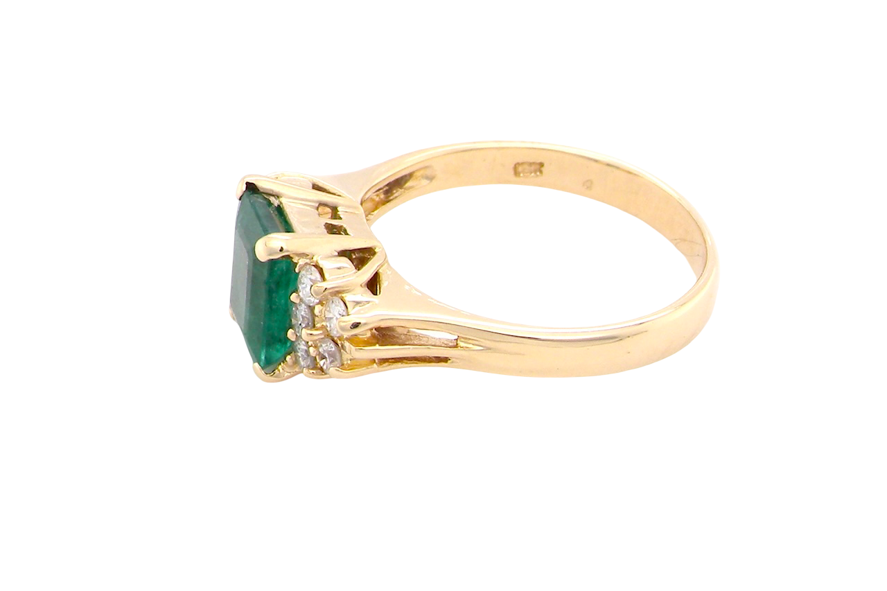 An Emerald & Diamond 18ct Gold Ring