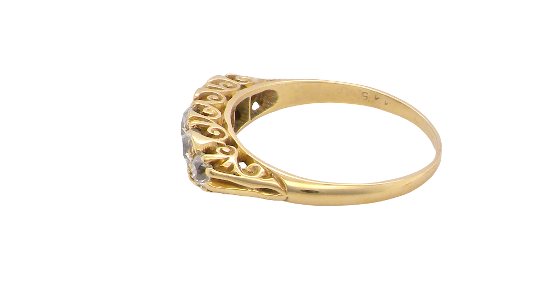 side An antique boat shaped five stone ring. Set with five old cut white diamonds. Centre 5mm (0.45-0.50 carats) each side a 4mm stone, at each end a 2.4mm stone. Total diamond content estimated at one carat.