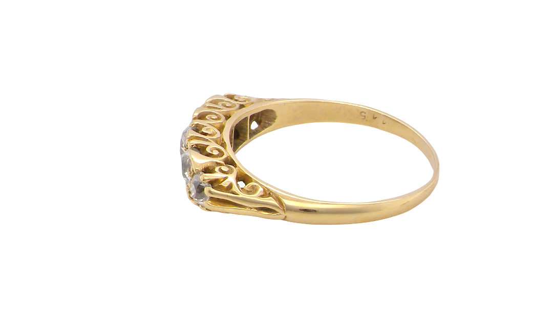 side An antique boat shaped five stone ring. Set with five old cut white diamonds. Centre 5mm (0.45-0.50 carats) each side a 4mm stone, at each end a 2.4mm stone. Total diamond content estimated at one carat.