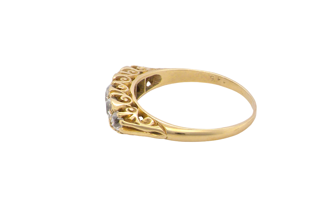 side An antique boat shaped five stone ring. Set with five old cut white diamonds. Centre 5mm (0.45-0.50 carats) each side a 4mm stone, at each end a 2.4mm stone. Total diamond content estimated at one carat.