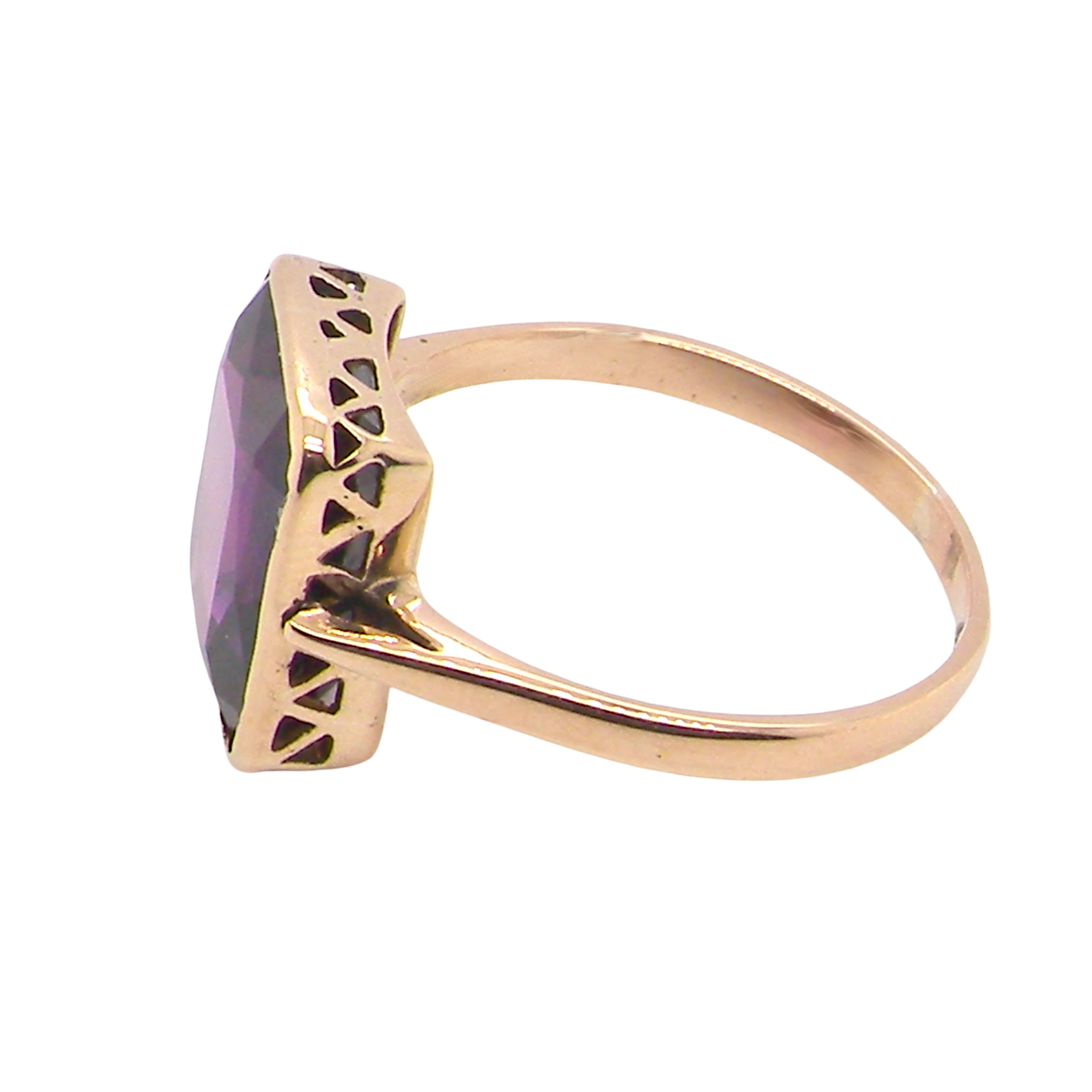 side An antique dress ring that features a rectangular cut amethyst. Very dark purple, measures 12x10mm. Rim setting.
