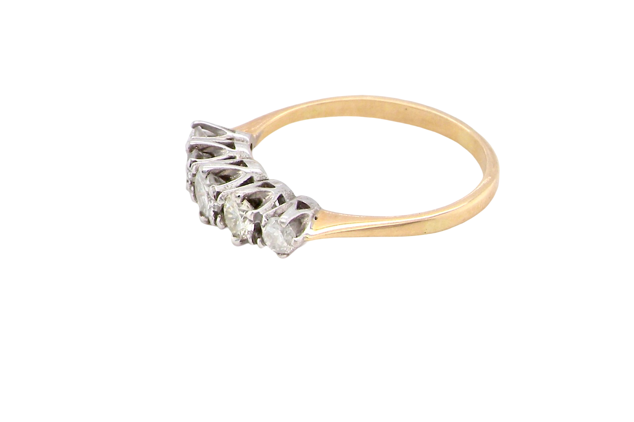 side An antique five-stone ring dating from the early 20th century,