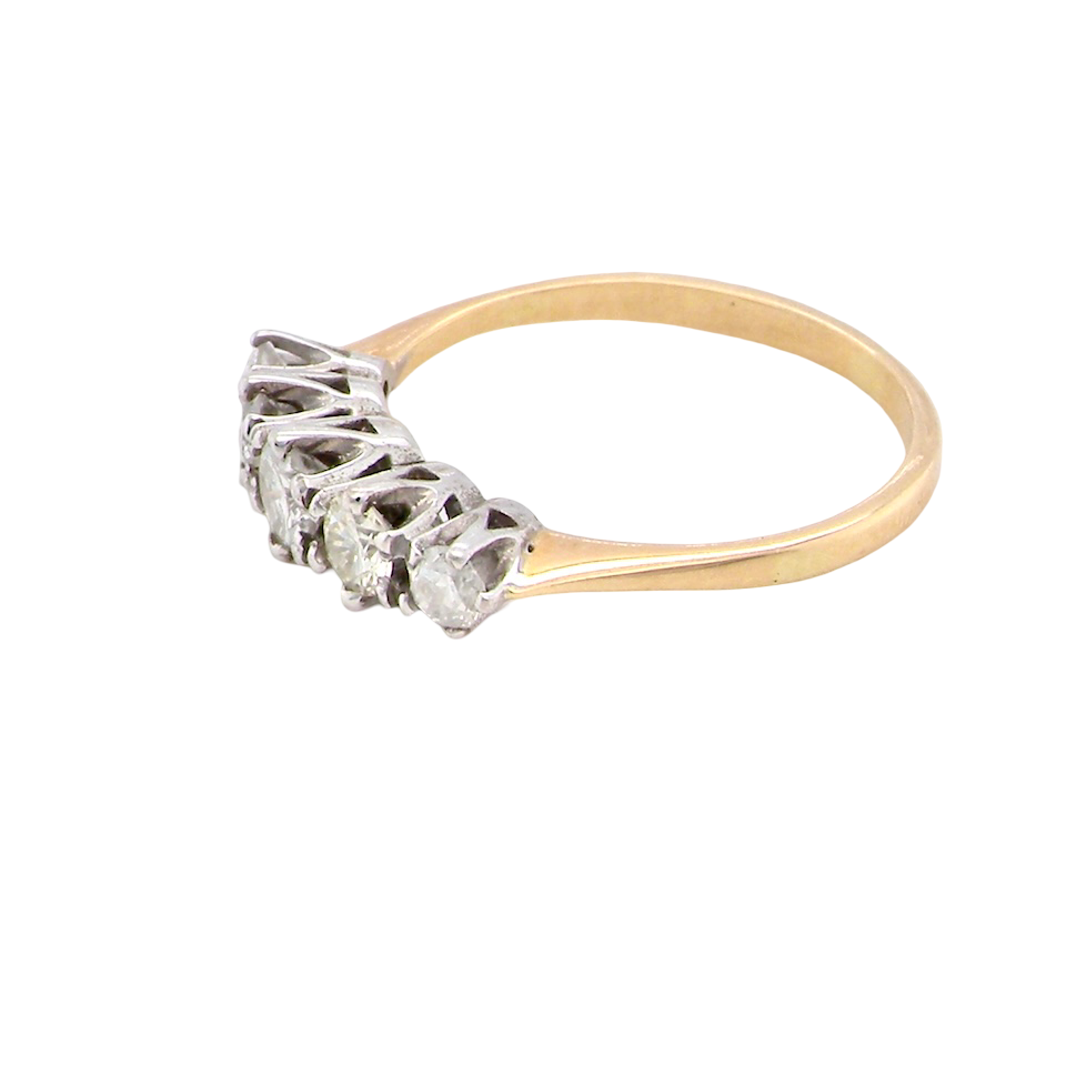 side An antique five-stone ring dating from the early 20th century,