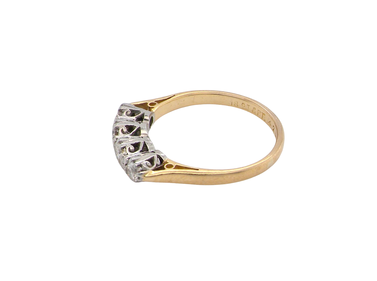 side An early 20th century ring set with diamonds.