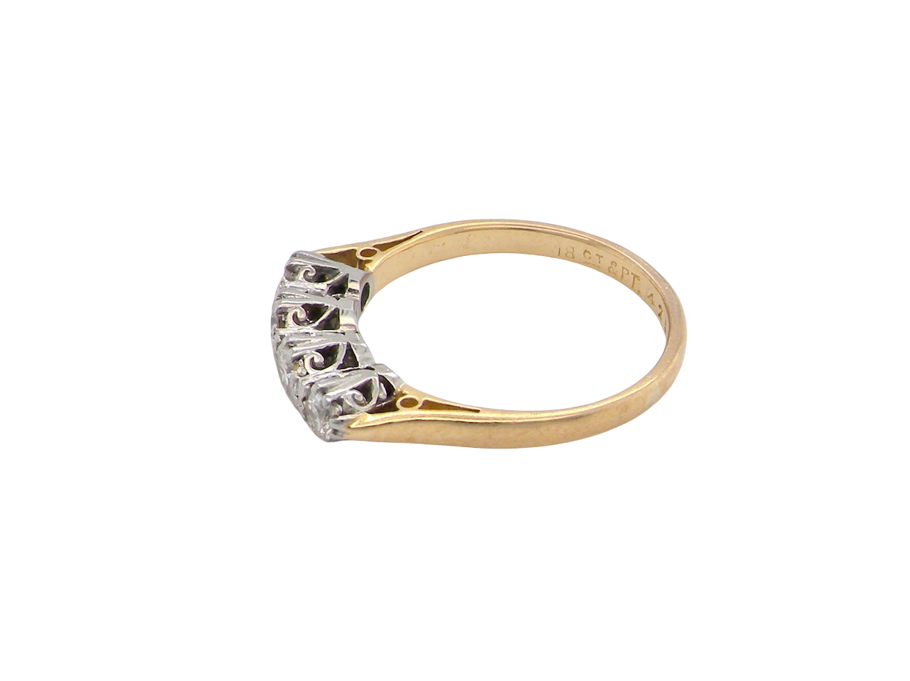 side An early 20th century ring set with diamonds.