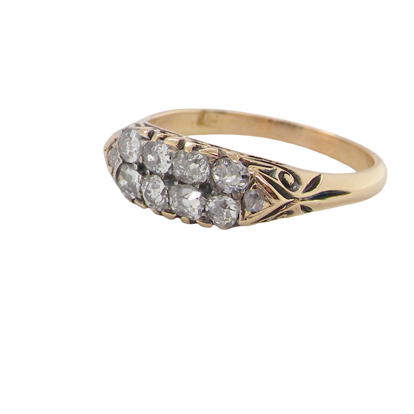 side An eight stone boat shaped diamond ring, with two extra 'accent' diamonds to each end