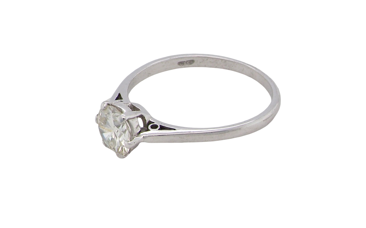 side An elegant single-stone solitaire ring set with an exceptional brilliant-cut white diamond, estimated at approximately 0.91 carats.