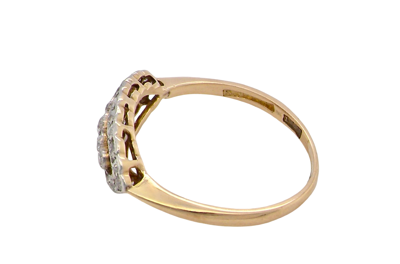 side An enchanting diamond ring from the early part of the 20th century.