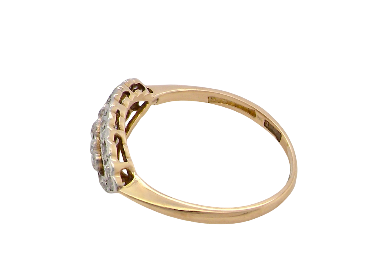 side An enchanting diamond ring from the early part of the 20th century.