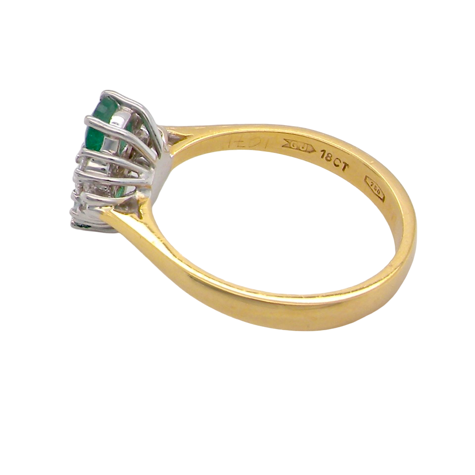 Gold ring with gemstones on a white background