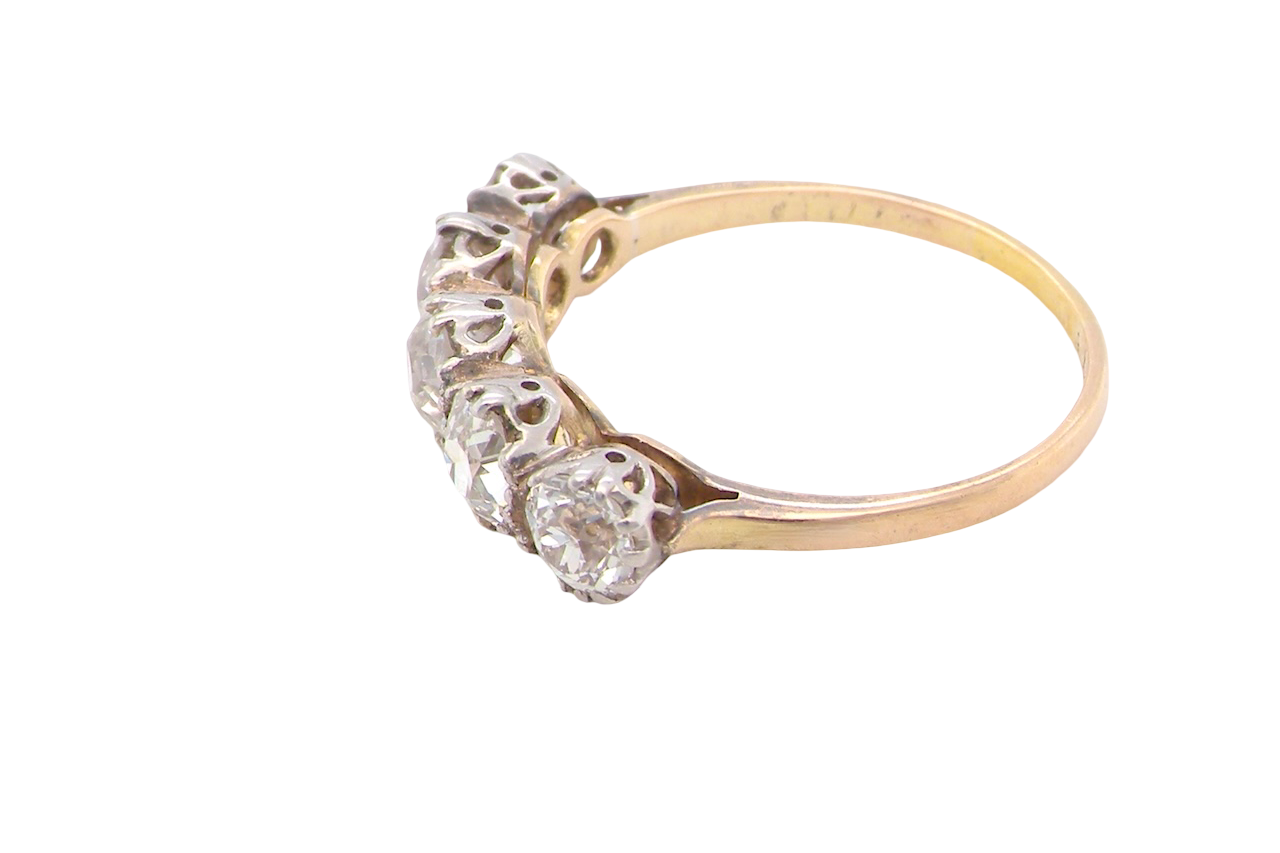 side- An impressive early 20th-century ring set with five old brilliant-cut white diamonds.