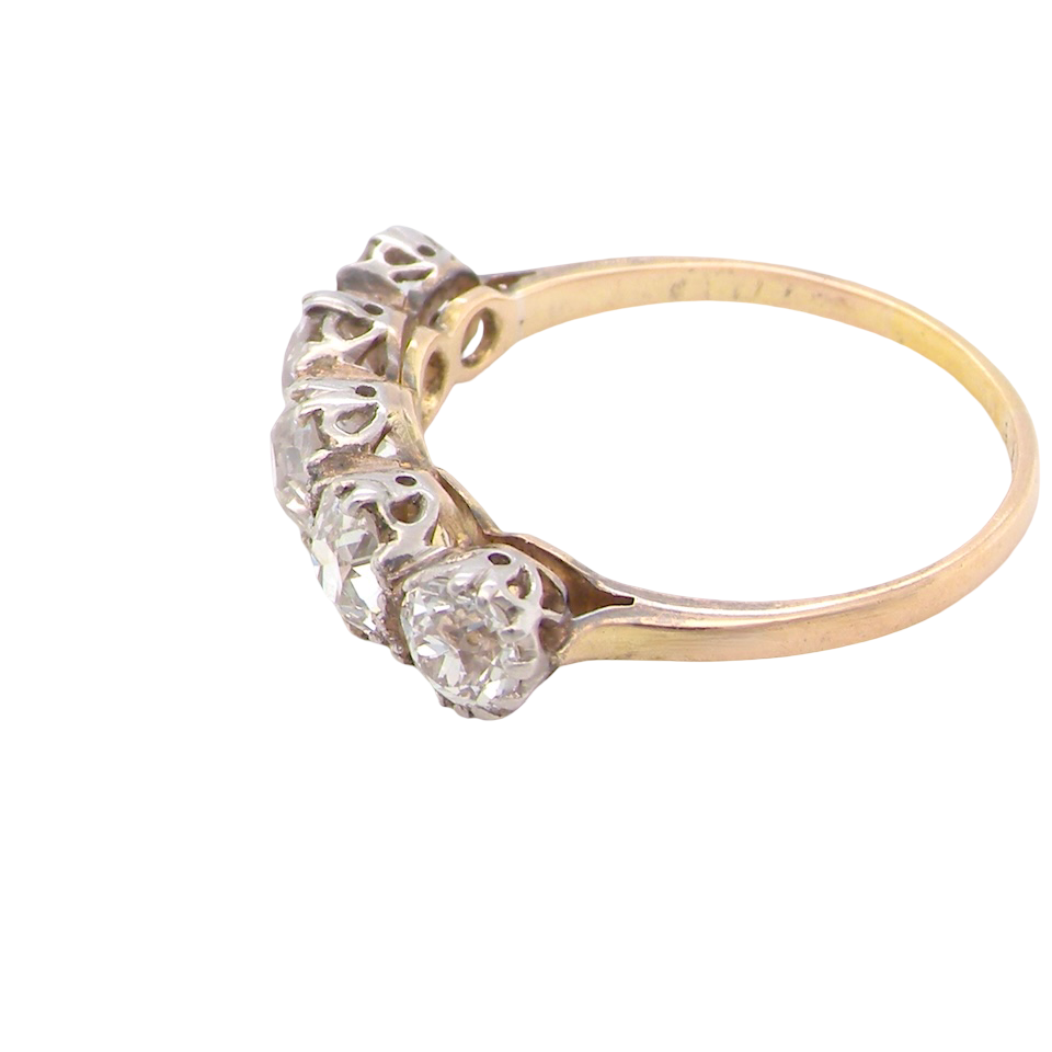 side- An impressive early 20th-century ring set with five old brilliant-cut white diamonds.