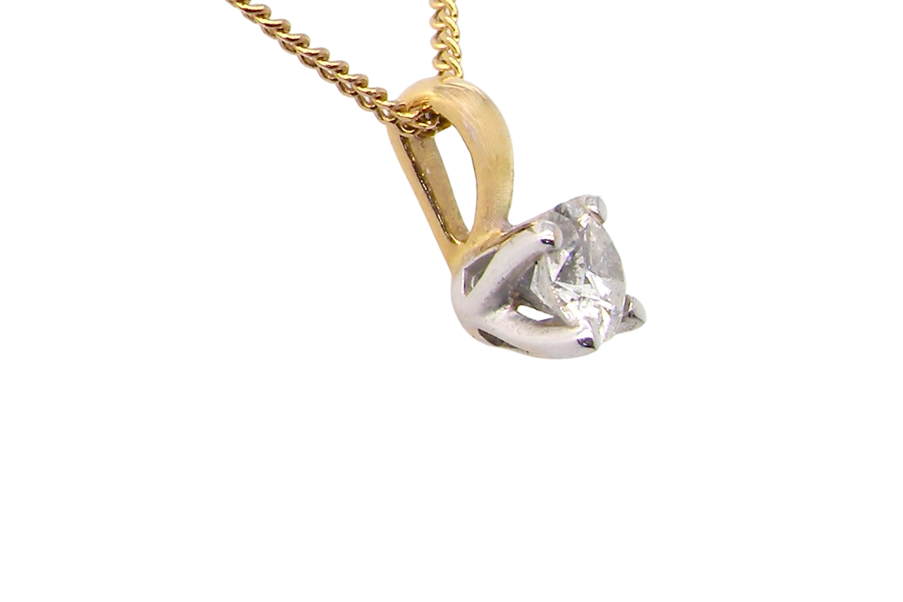 side Elegant and timeless, this solitaire diamond pendant showcases a beautifully cut 4mm round brilliant diamond, weighing 0.25 carats. The diamond features a bright H–J colour and Si clarity
