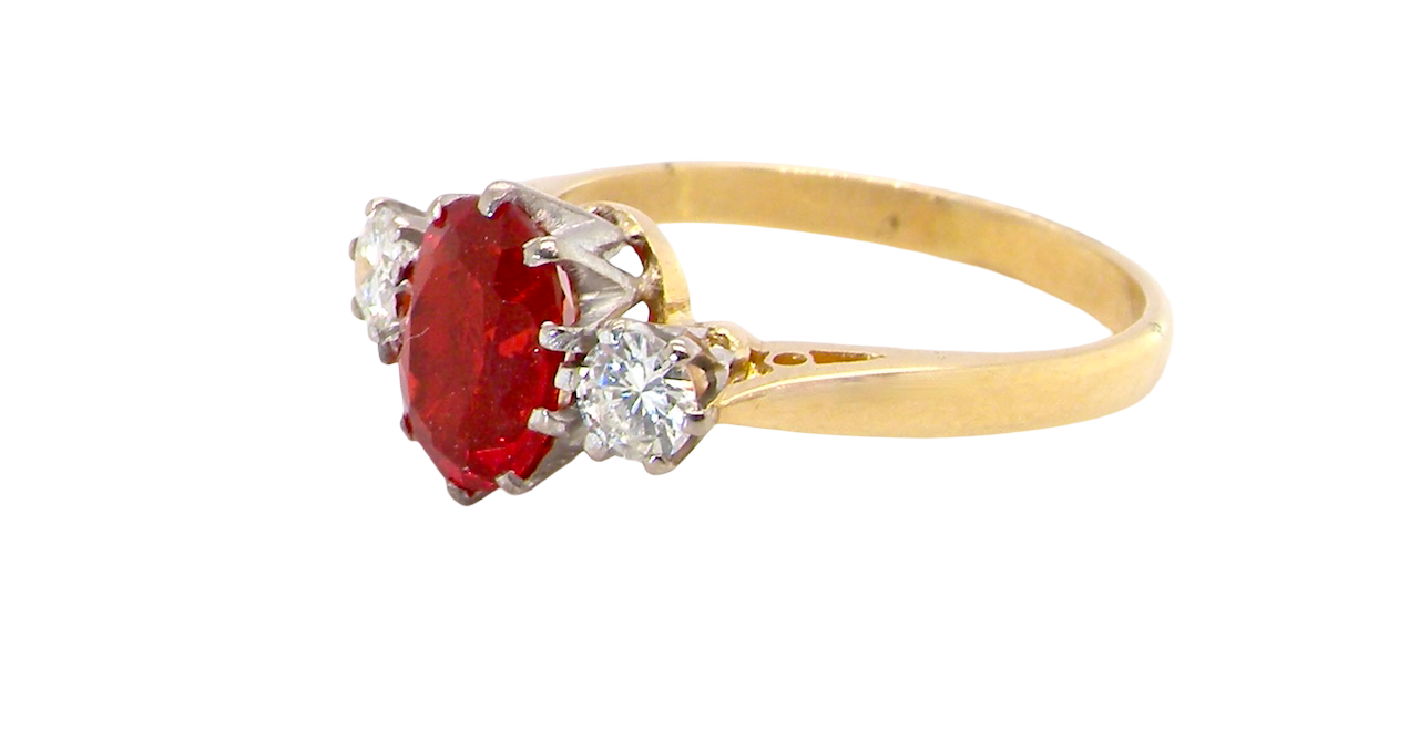 side If orange is your favourite colour, this stunning ring is just for you! A vibrant fireglow orange opal sets this ring apart form the everyday norm!