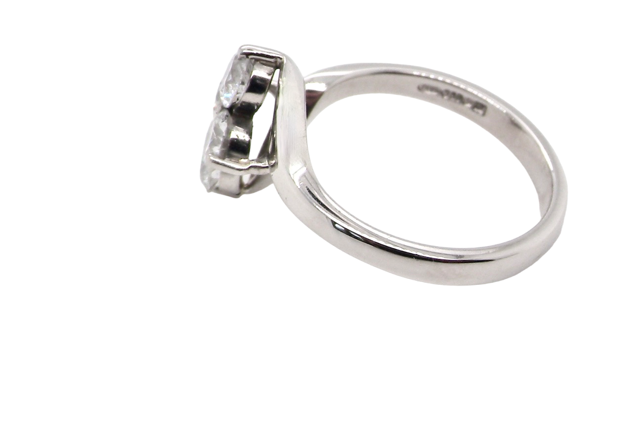 side This four stone ring features brilliant cut white diamonds, each 4mm (0.25 carats). The total estimated weight is one carat, with a colour rating of G-H and a clarity rating of SI.