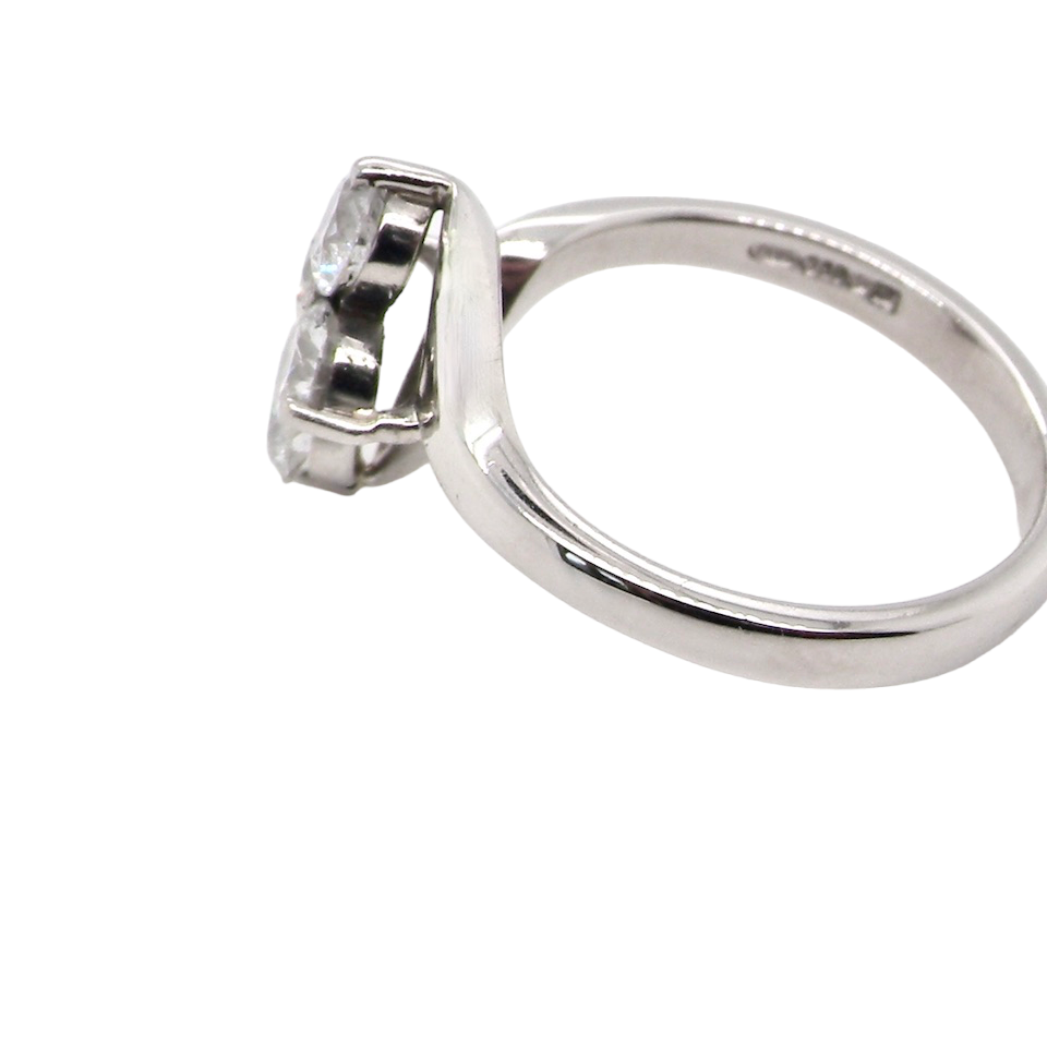 side This four stone ring features brilliant cut white diamonds, each 4mm (0.25 carats). The total estimated weight is one carat, with a colour rating of G-H and a clarity rating of SI.