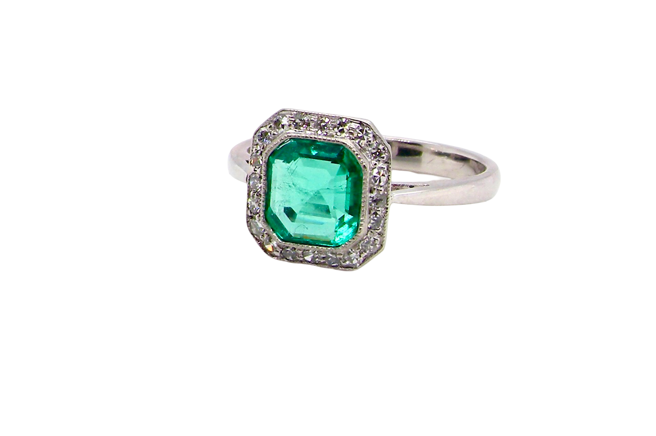 side beautiful emerald rings we have had in our collections. The ring from the Art Deco period is set with an exquisite emerald centre stone.