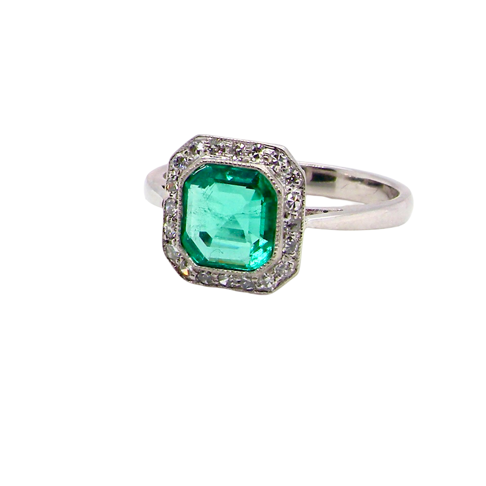 side beautiful emerald rings we have had in our collections. The ring from the Art Deco period is set with an exquisite emerald centre stone.