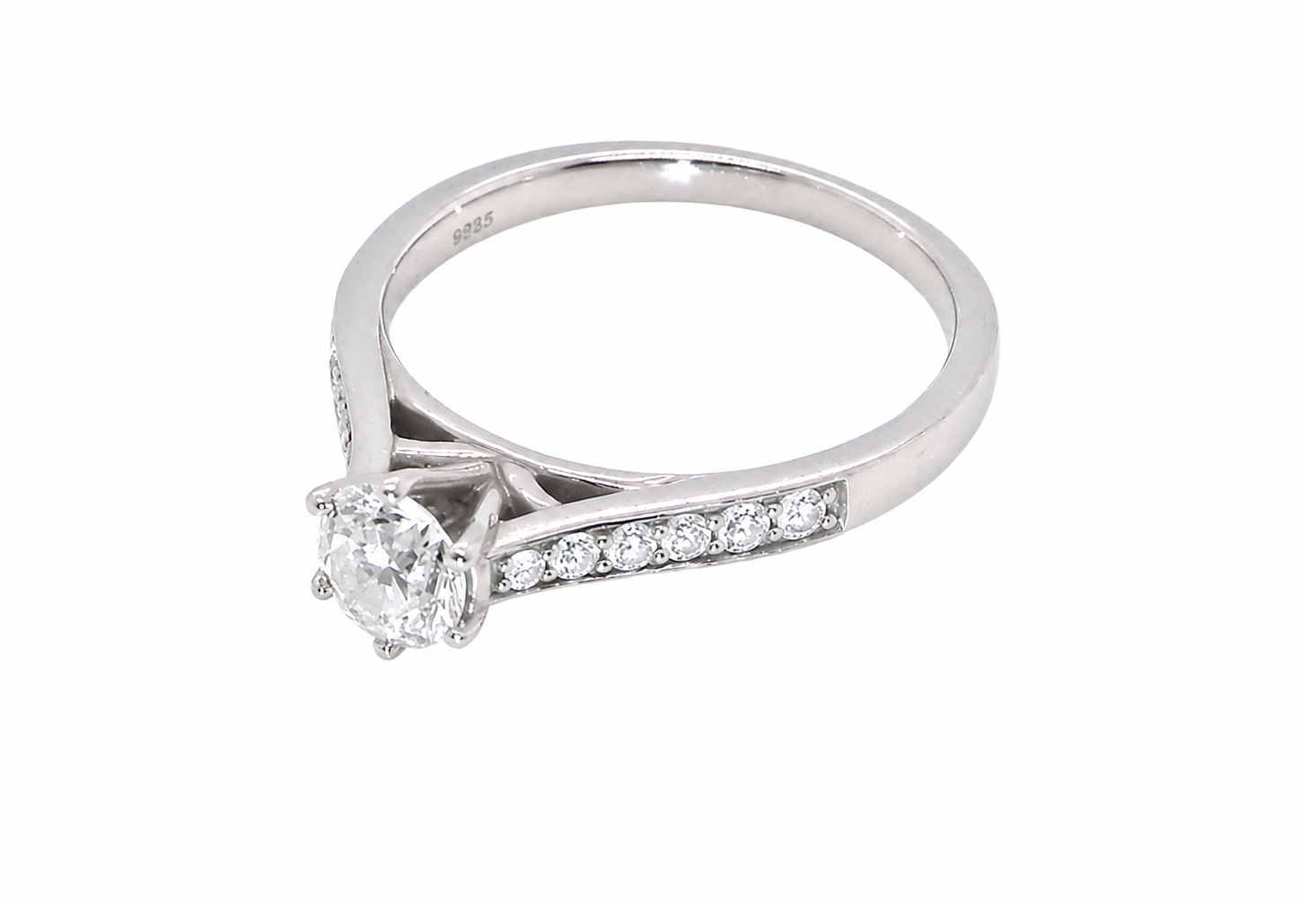 side beautiful platinum solitaire ring featuring a brilliant-cut white diamond, claw set, measuring 4.8mm and weighing approximately 0.65ct. Diamond graded I colour, SI1 clarity, with an 88-facet cut.