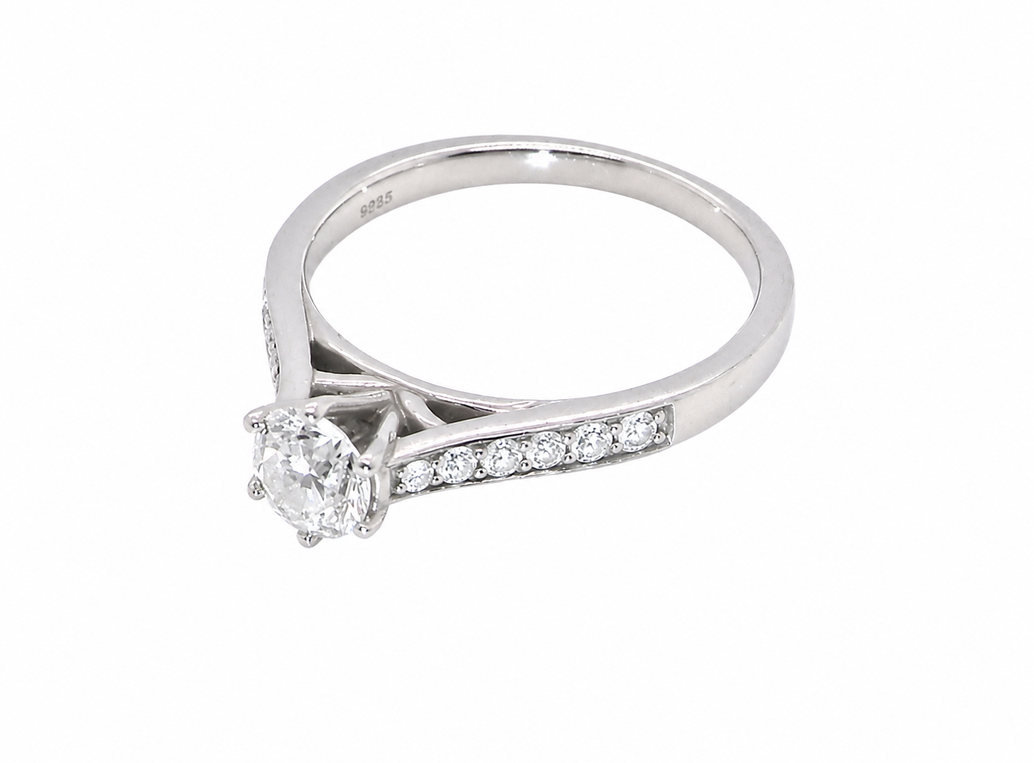 side beautiful platinum solitaire ring featuring a brilliant-cut white diamond, claw set, measuring 4.8mm and weighing approximately 0.65ct. Diamond graded I colour, SI1 clarity, with an 88-facet cut.