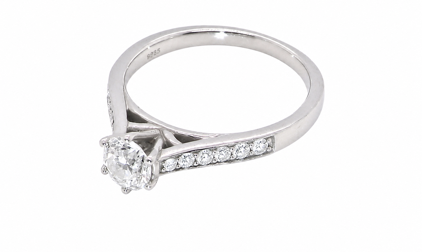 side beautiful platinum solitaire ring featuring a brilliant-cut white diamond, claw set, measuring 4.8mm and weighing approximately 0.65ct. Diamond graded I colour, SI1 clarity, with an 88-facet cut.