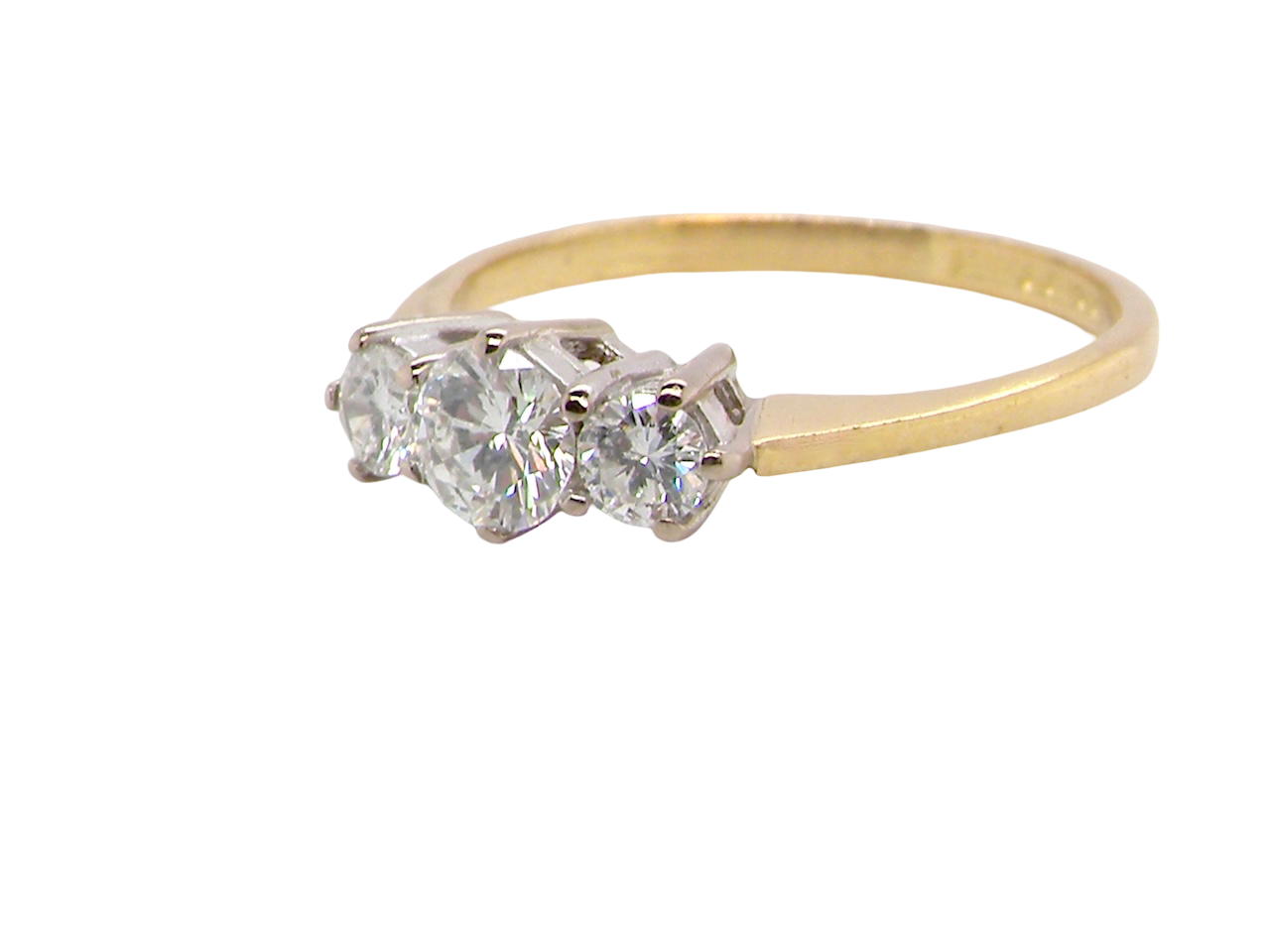 side elegant modern trilogy ring is set with three brilliant-cut white diamonds in a timeless and meaningful design.